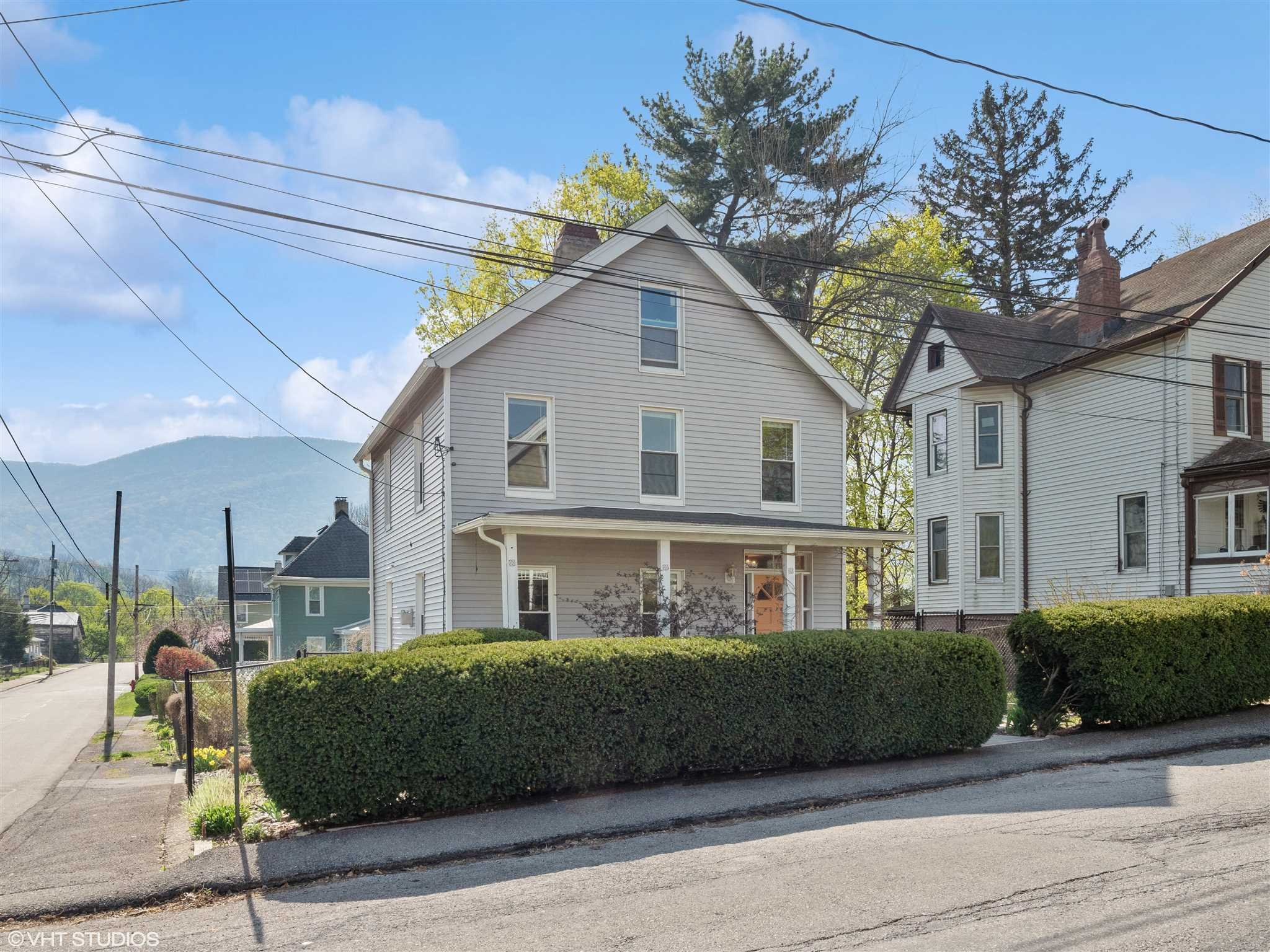 20 John Street Beacon, NY 12508 - Photo 3 of 36 a view of a house with a patio