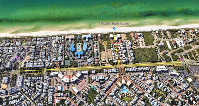 a view of a water with an umbrella