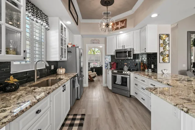 a bathroom with a shower and a sink