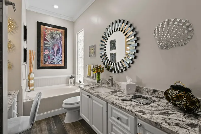 a view of a pathway of a house with a fountain in porch