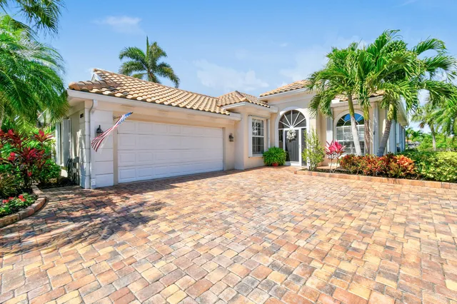 a view of entryway with furniture and wooden floor