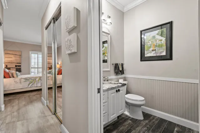 a view of a lake with houses in the back