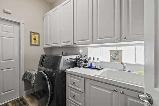 a view of a lake with a house in the background