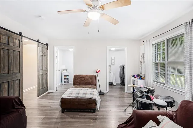 a living room with furniture and a window