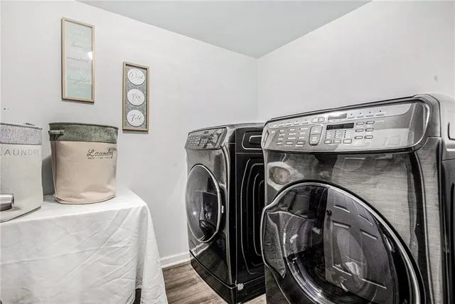 a utility room with dryer and washer