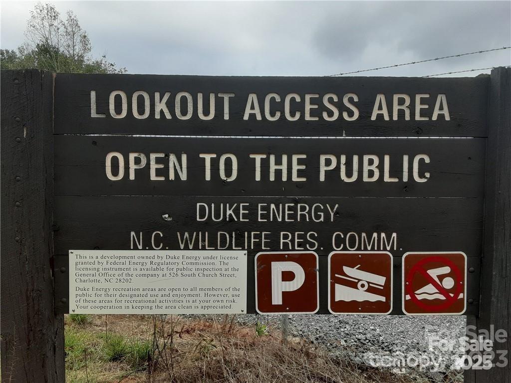 4351 Lookout Dam Road Catawba, NC 28609 - Photo 3 of 6 a street sign that is on the wall of building