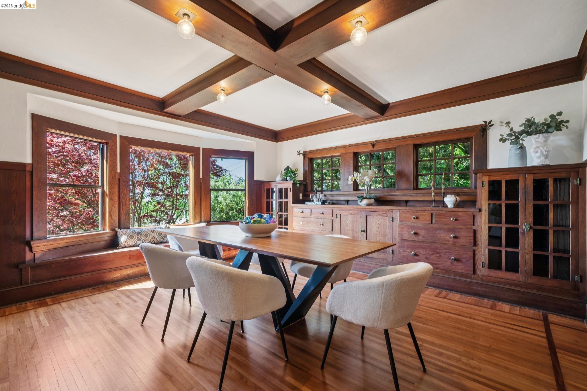 813 San Diego Road Berkeley, CA 94707 - Photo 14 of 60 a dining room with furniture window wooden floor