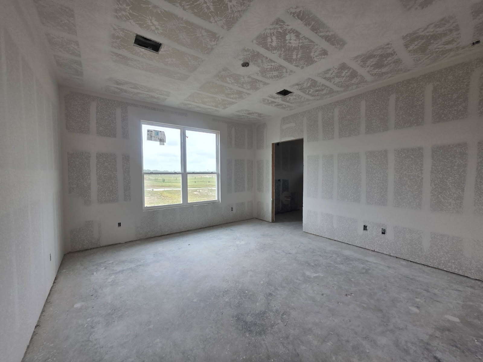 1500 Lk Rdg Drive Brenham, TX 77833 - Photo 5 of 13 an empty room with windows