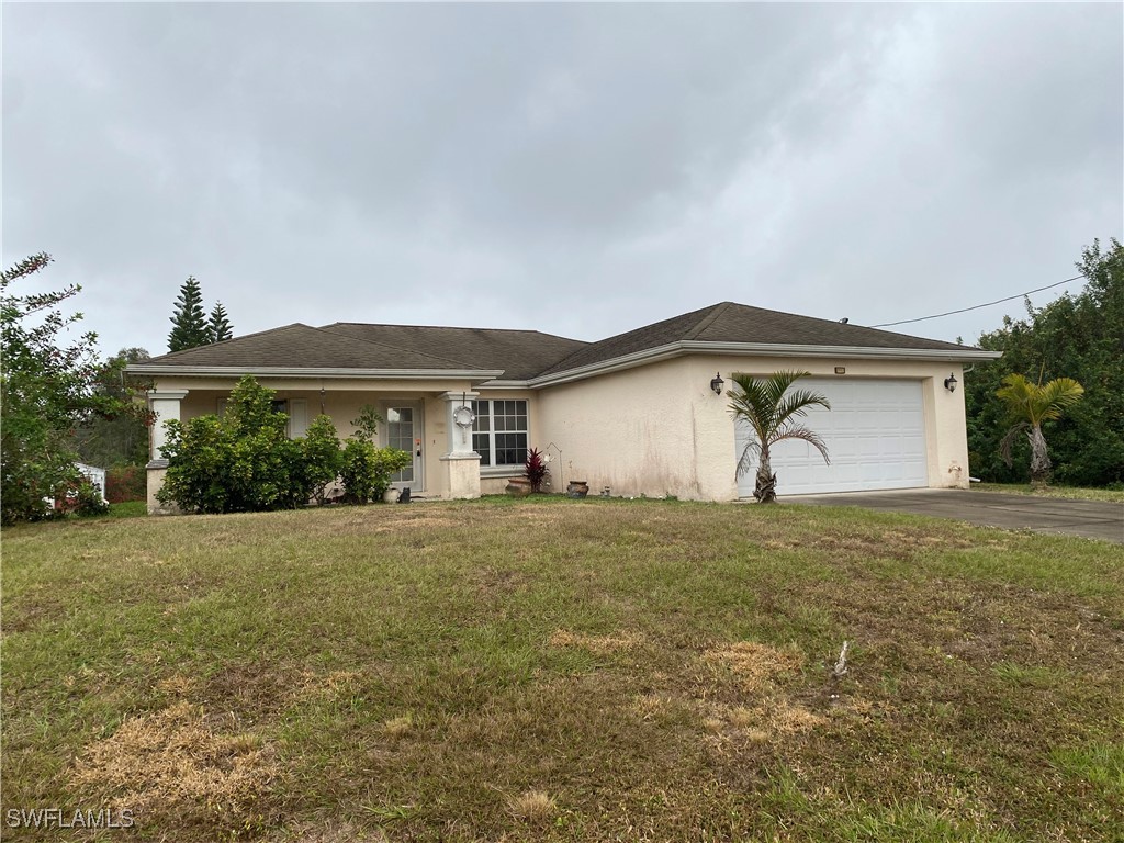 331 Ranier Avenue Lehigh Acres, FL 33974 - Photo 2 of 13 Gallery Image 2