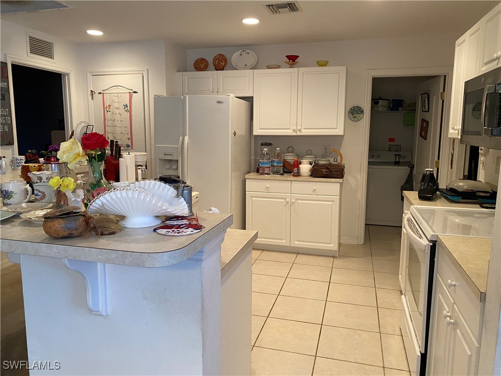 331 Ranier Avenue Lehigh Acres, FL 33974 - Photo 9 of 13 Gallery Image 9