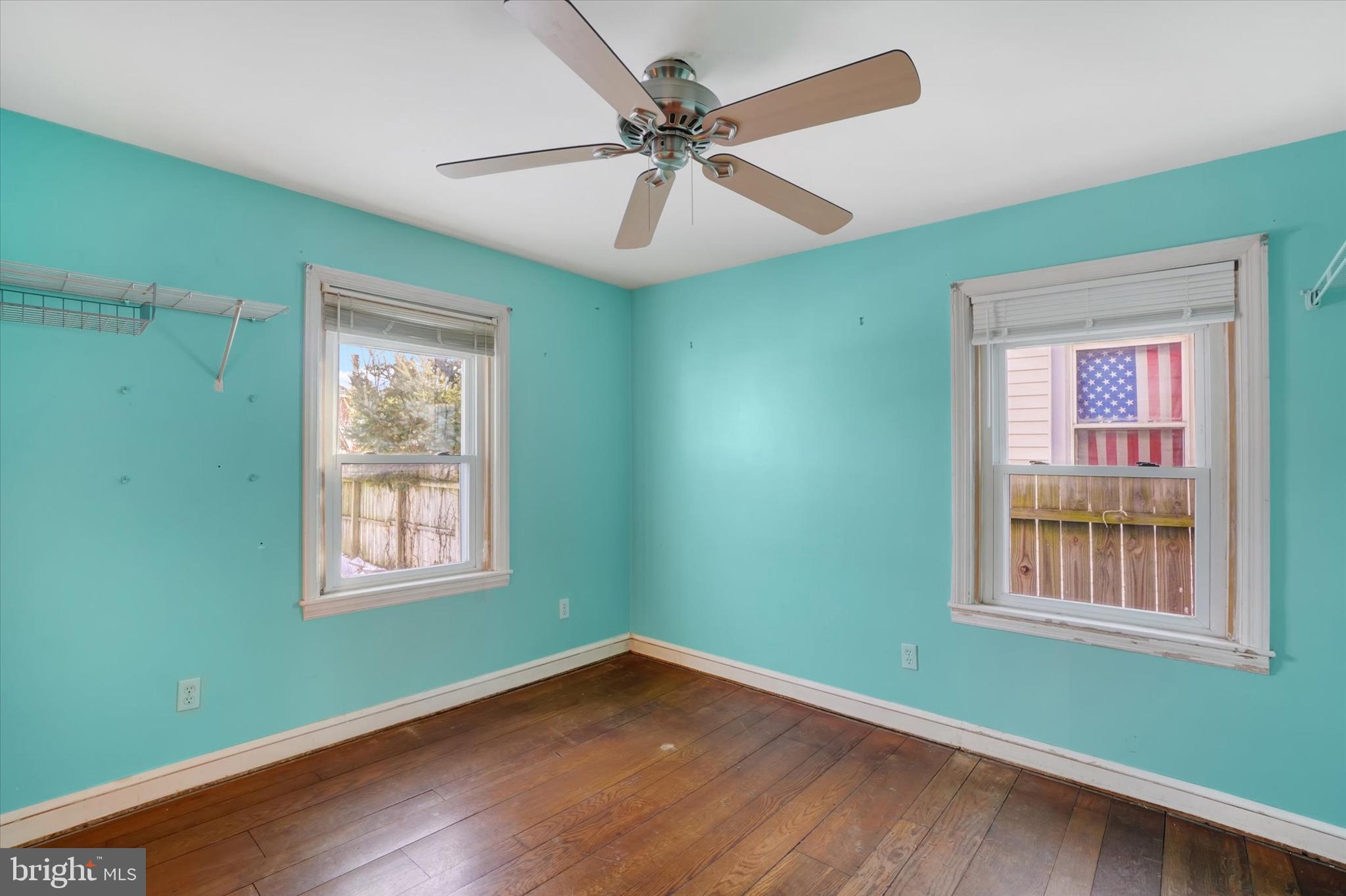 321 Frederick Court York, PA 17403 - Photo 12 of 24 a view of an empty room with window and wooden floor