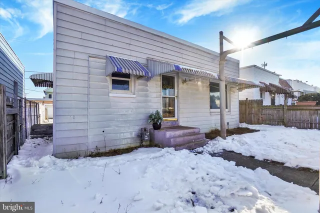 a view of a house with a snow