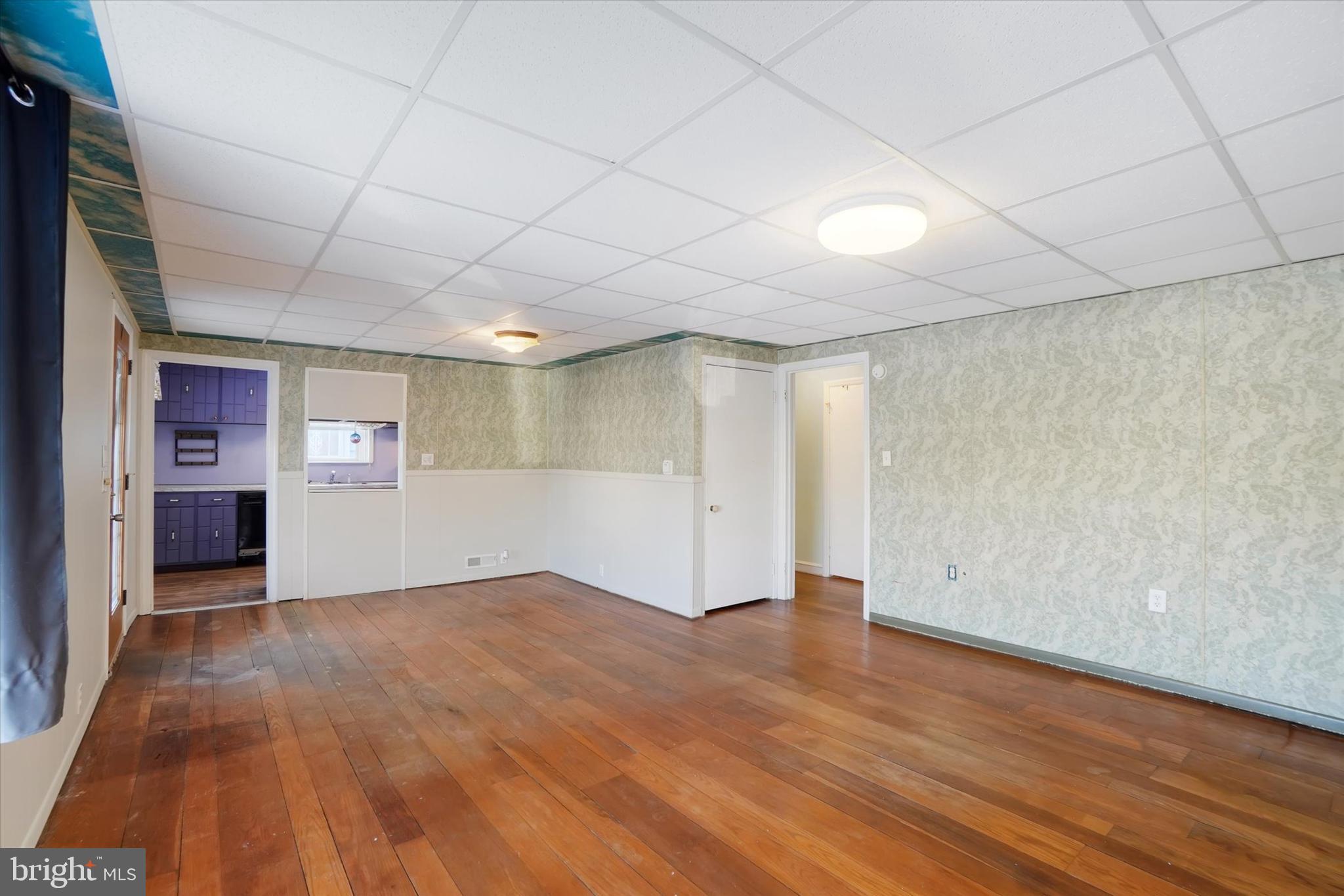 321 Frederick Court York, PA 17403 - Photo 5 of 24 wooden floor in an empty room with a window