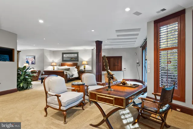 a view of a patio with a dining table and chairs