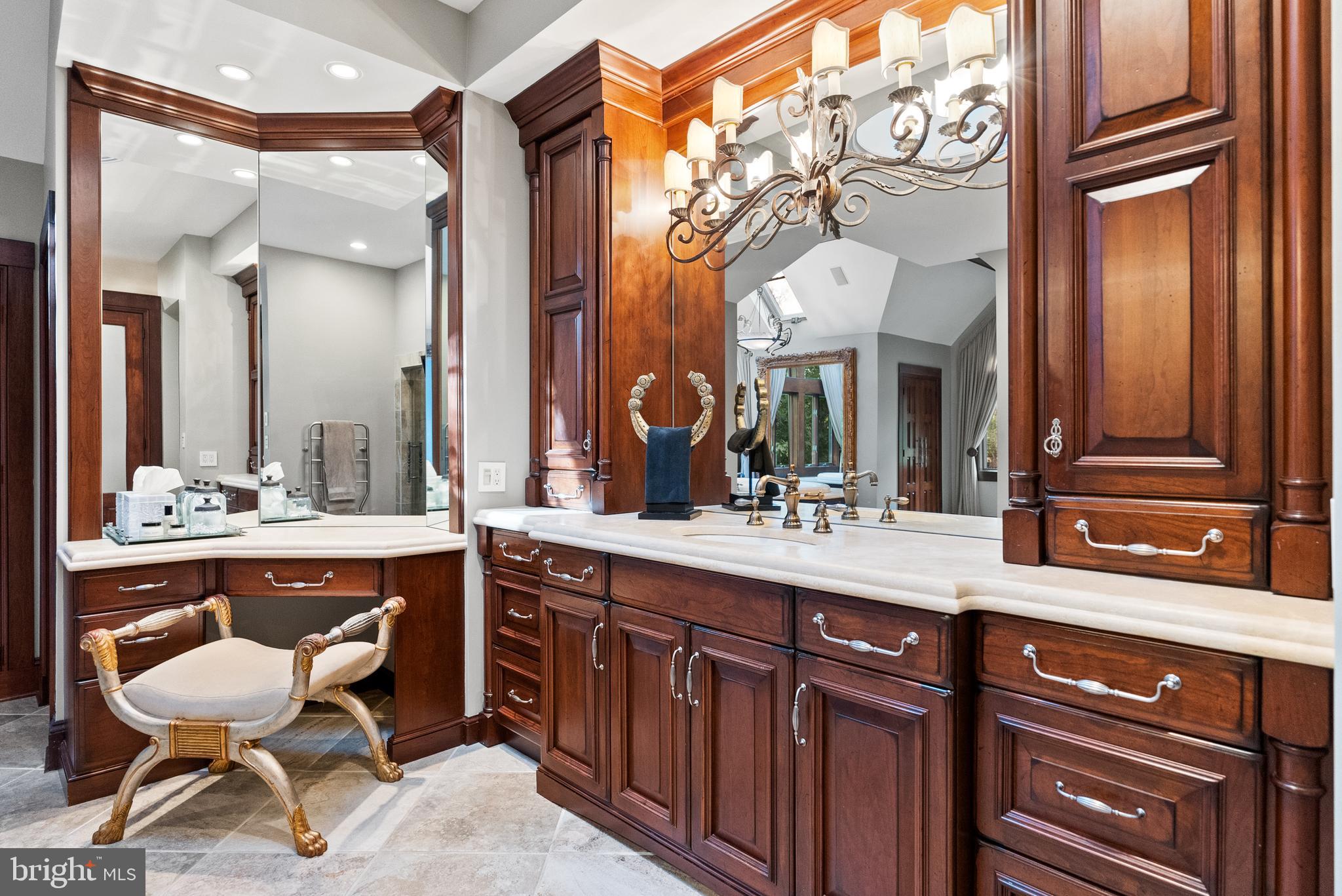 536 Springvale Road Great Falls, VA 22066 - Photo 51 of 139 a bathroom with a double vanity sink and a mirror