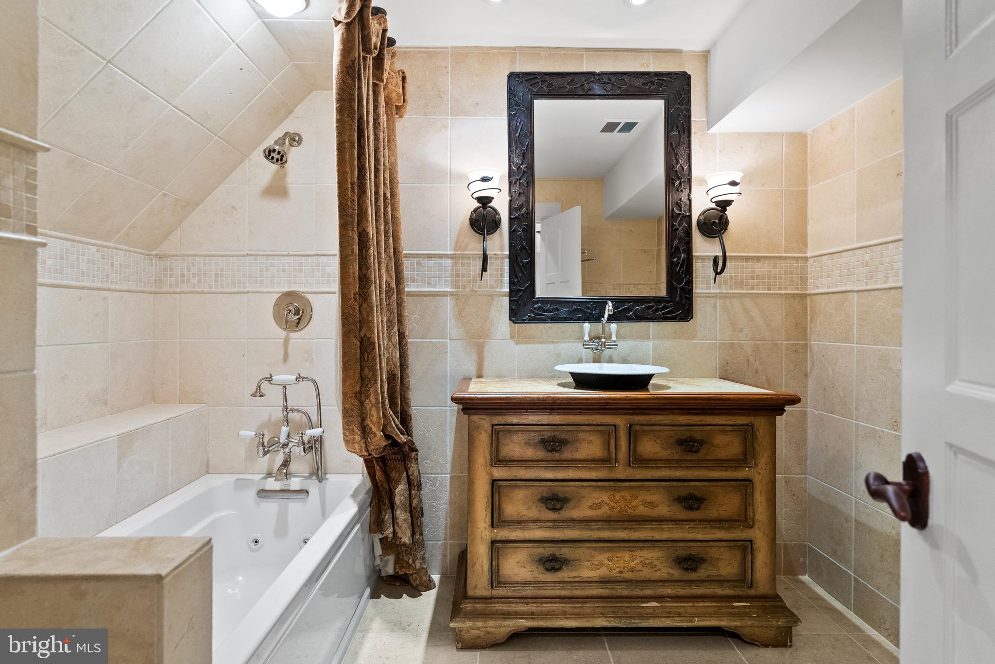 536 Springvale Road Great Falls, VA 22066 - Photo 89 of 139 a bathroom with a sink and a mirror