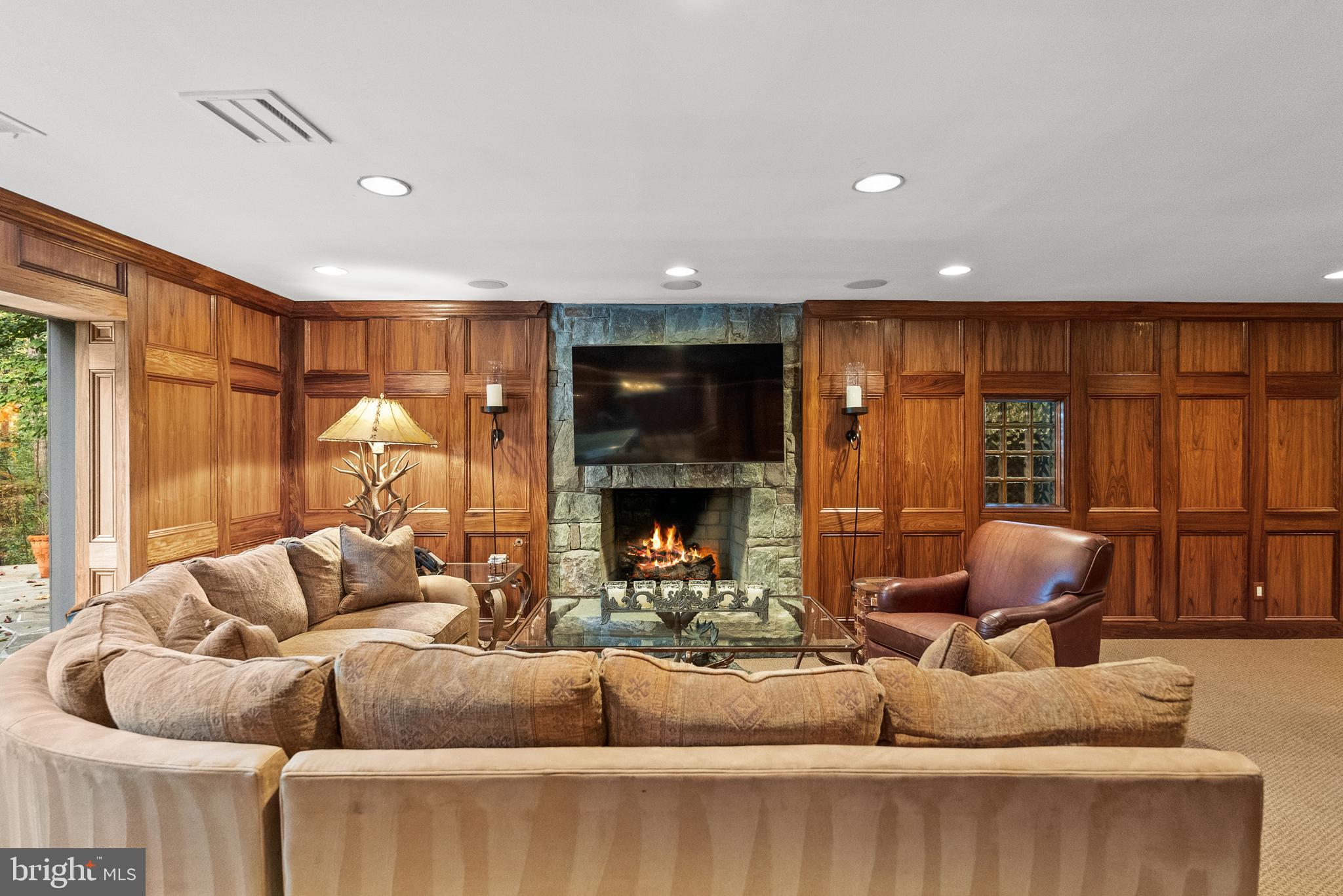 536 Springvale Road Great Falls, VA 22066 - Photo 97 of 139 a living room with furniture and a fireplace