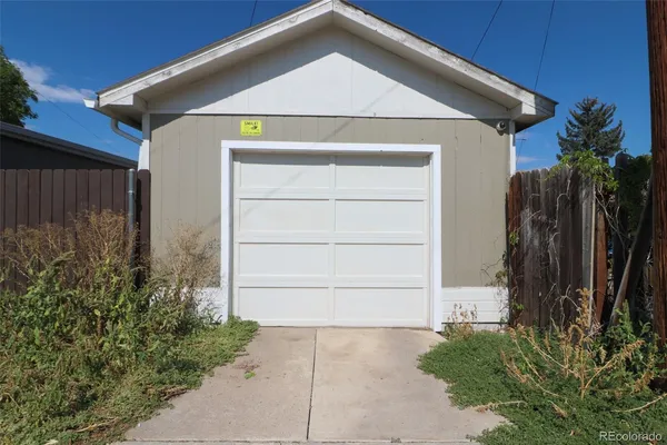 a front view of a house with a garage