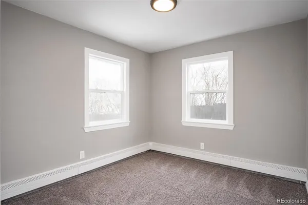 an empty room with a window