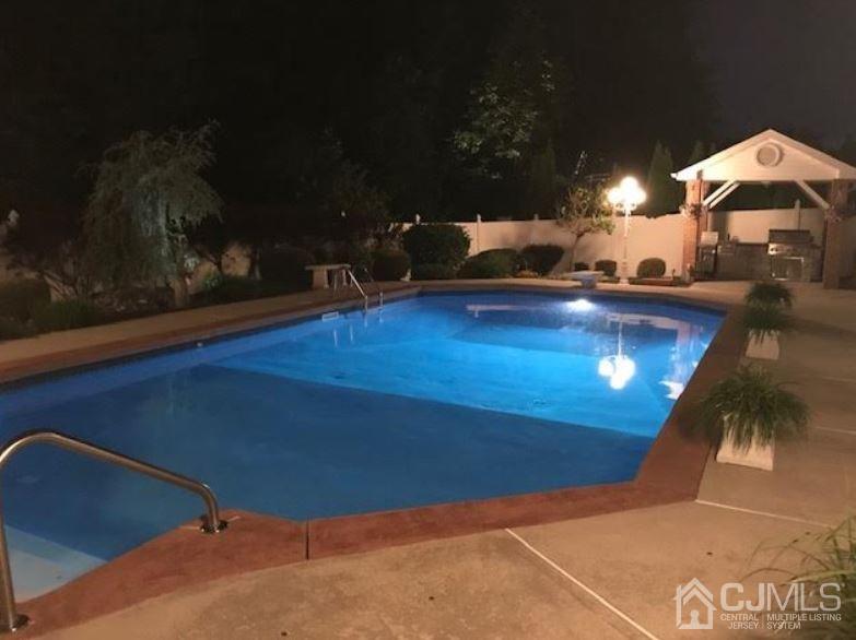 54 Stratton Road Old Bridge, NJ 07747 - Photo 23 of 23 a view of a swimming pool with an outdoor space