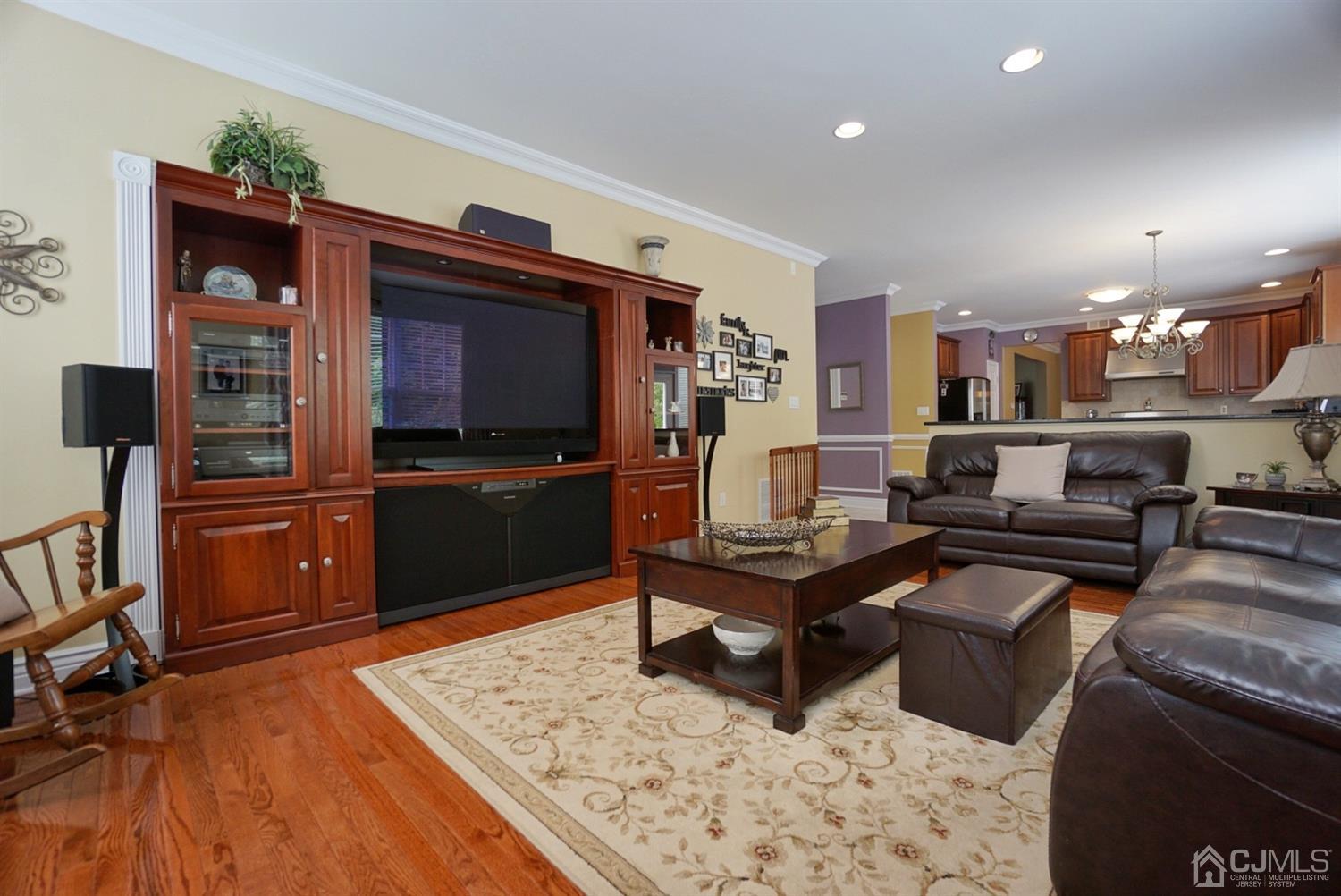54 Stratton Road Old Bridge, NJ 07747 - Photo 8 of 23 a living room with furniture and a flat screen tv