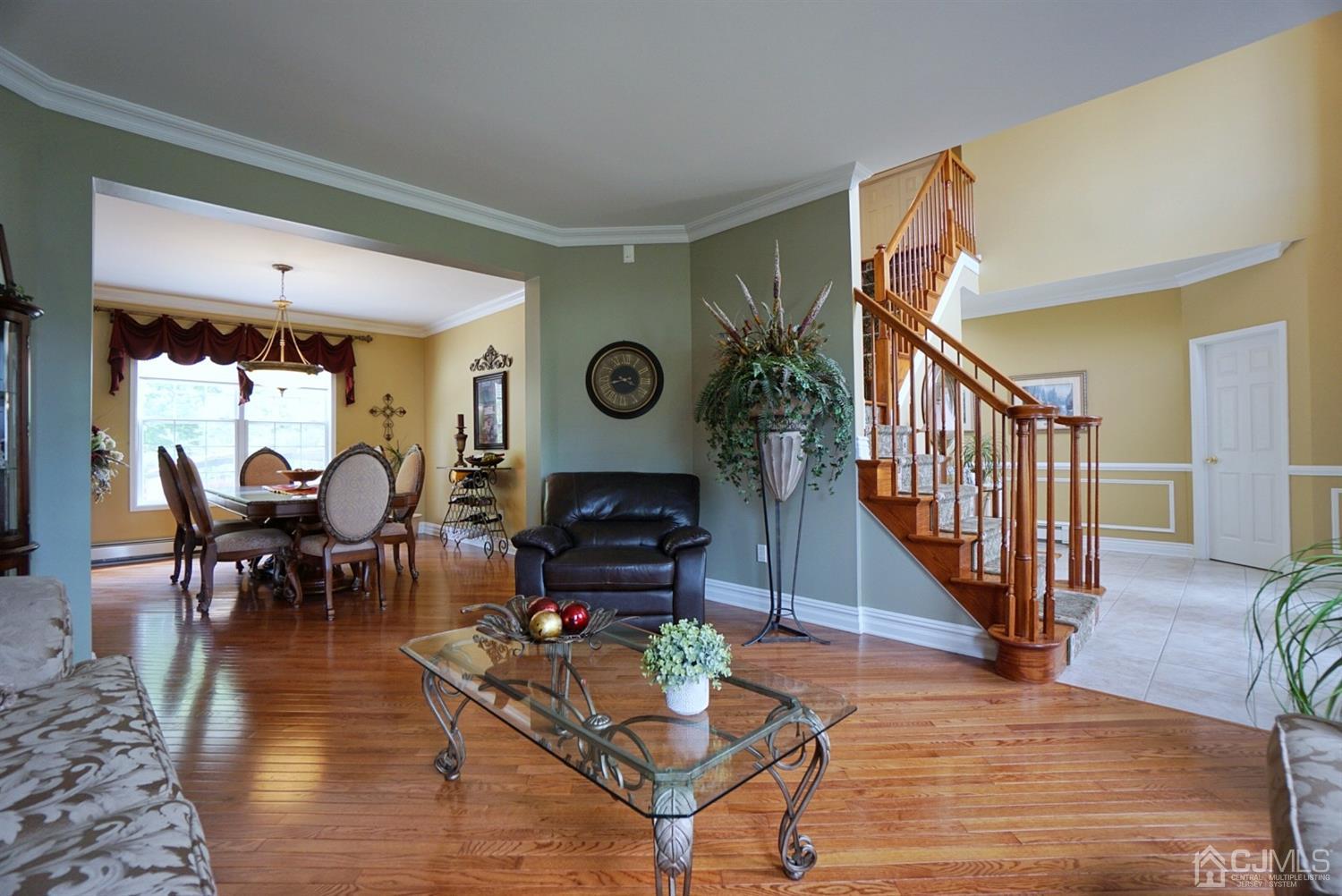 54 Stratton Road Old Bridge, NJ 07747 - Photo 10 of 23 a living room with furniture and a fireplace