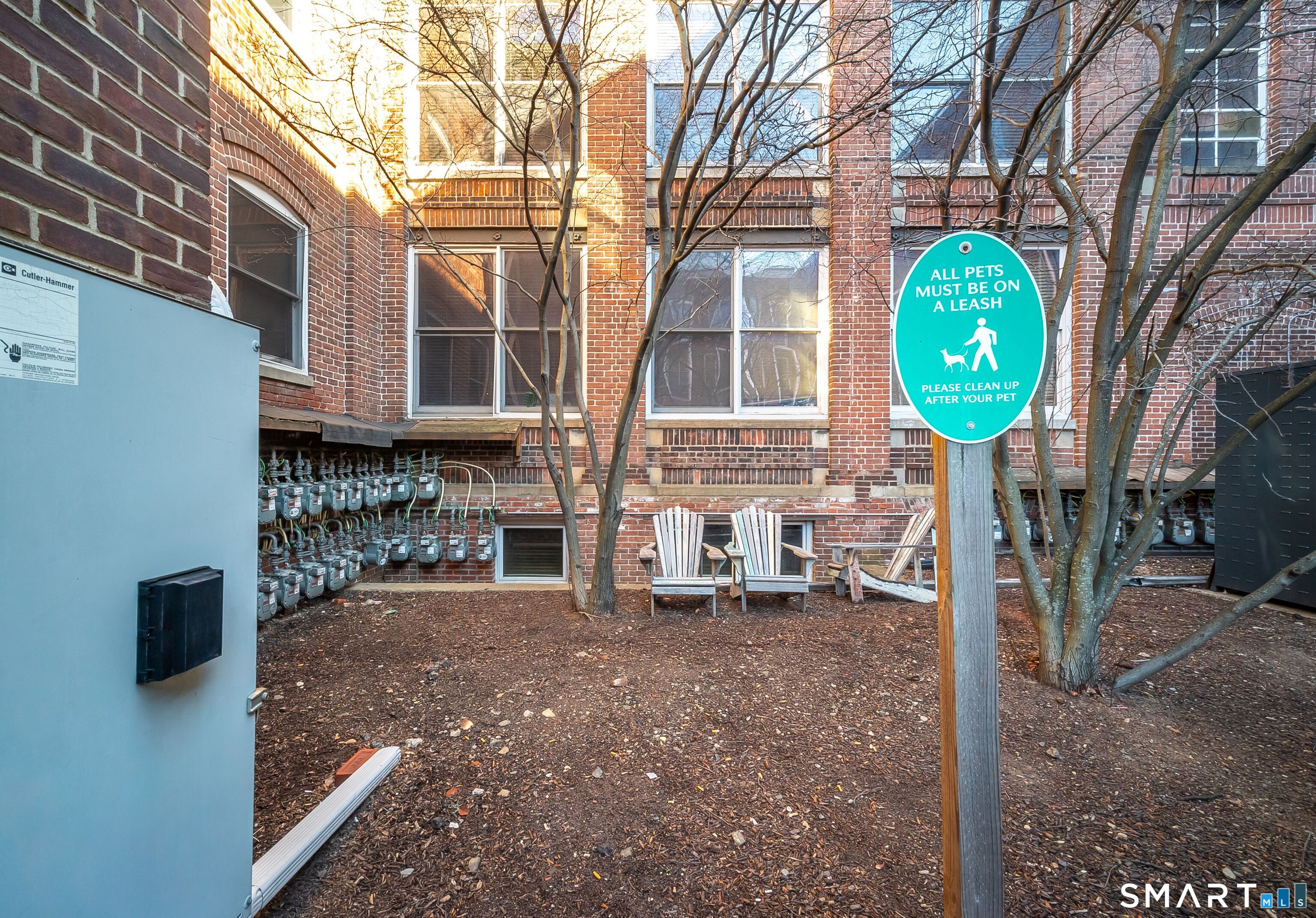 325 Lafayette Street, Unit 8205 Bridgeport, CT 06604 - Photo 20 of 23 a front view of a house with garden