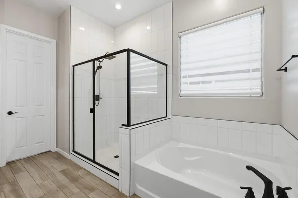 a view of a house with a backyard and sitting area