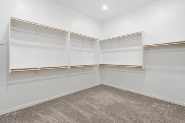 a front view of a house with yard porch and green space