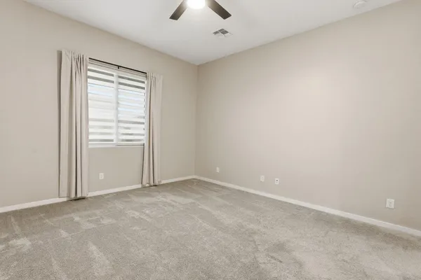 a view of a kitchen with a stove and a wooden floors