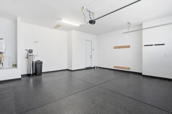 a view of a kitchen with a sink and a window