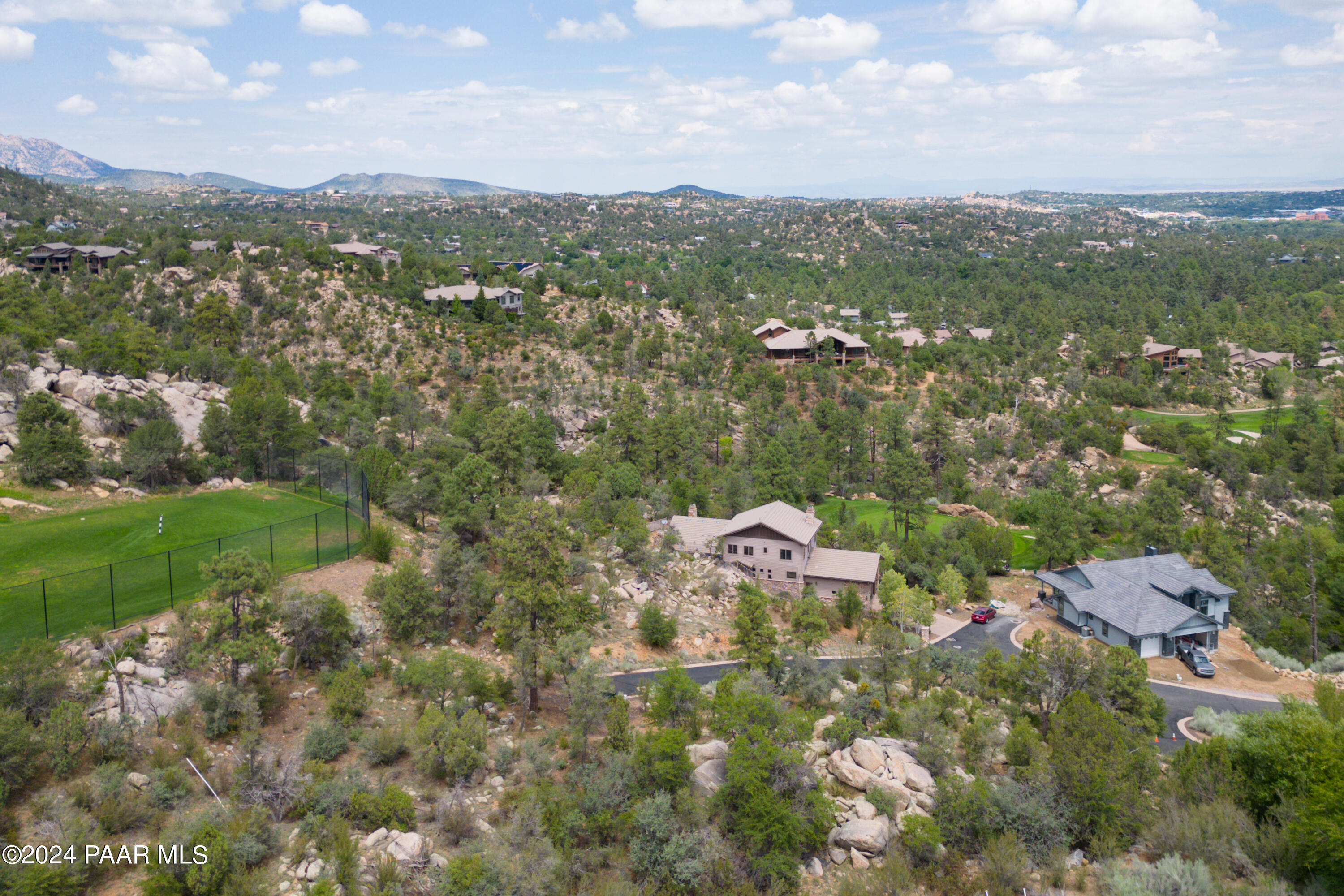 1920 Los Pinons Prescott, AZ 86303 - Photo 25 of 28 an aerial view of residential houses with outdoor space and trees