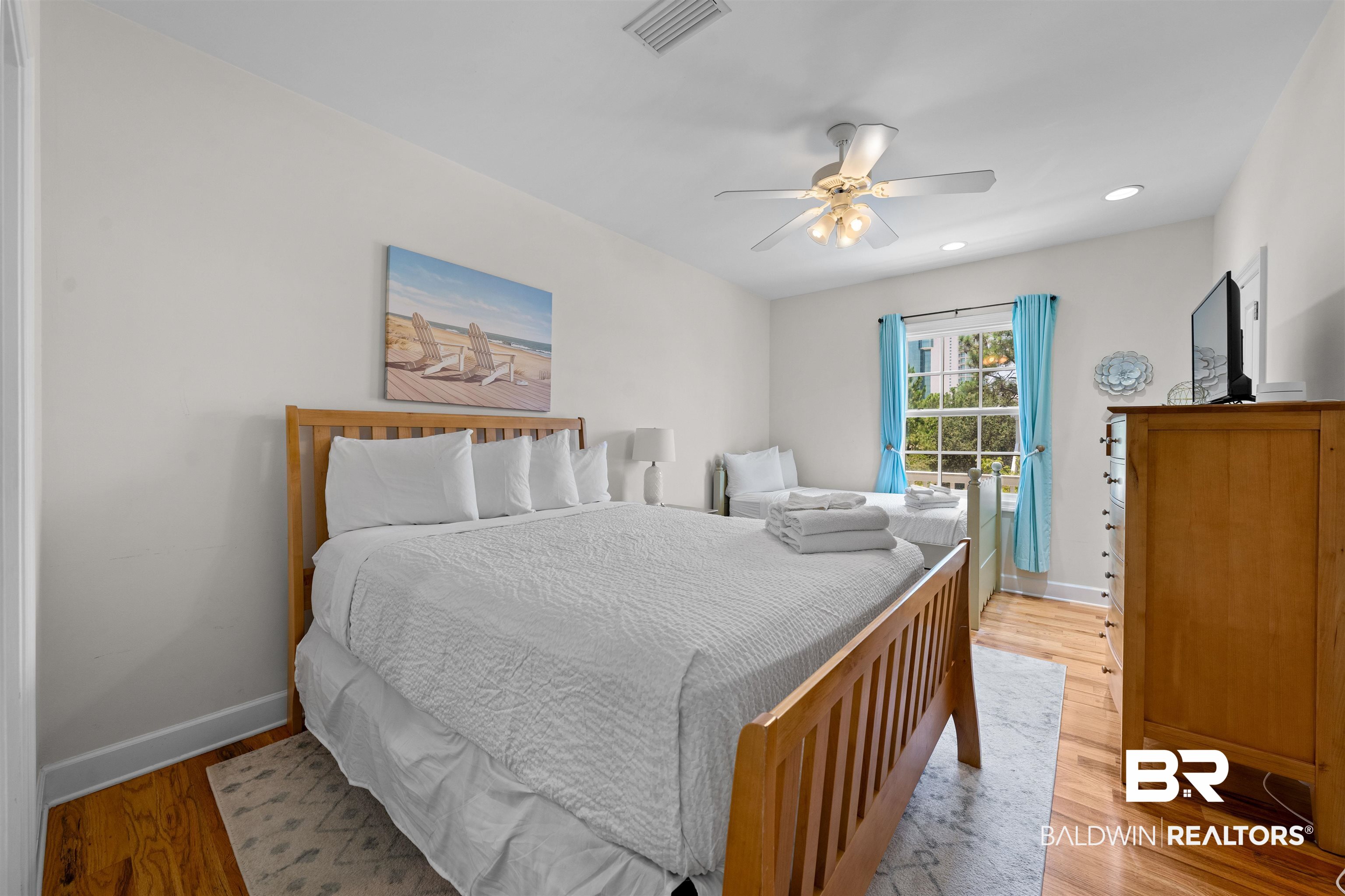 3434 Mariner Circle Orange Beach, AL 36561 - Photo 29 of 38 Bedroom with light hardwood / wood-style floors and ceiling fan