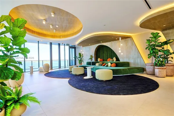 a view of swimming pool with a dining table and chairs