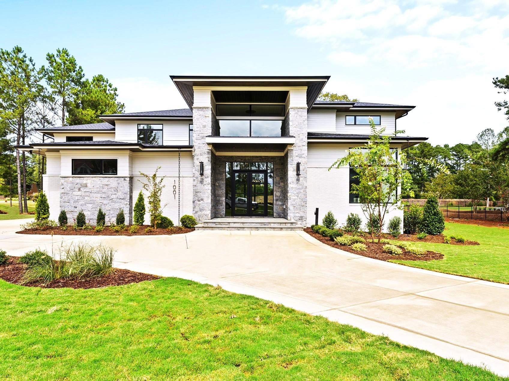 front view of a house with a yard