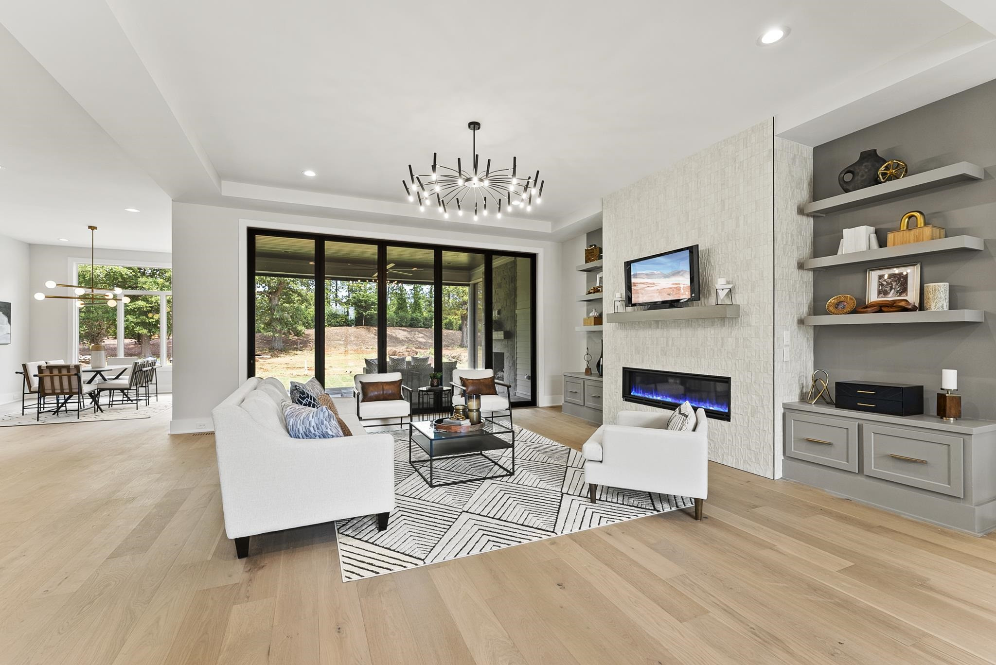 1001 Enchanted Pine Lane Raleigh, NC 27614 - Photo 11 of 52 a living room with furniture and a fireplace