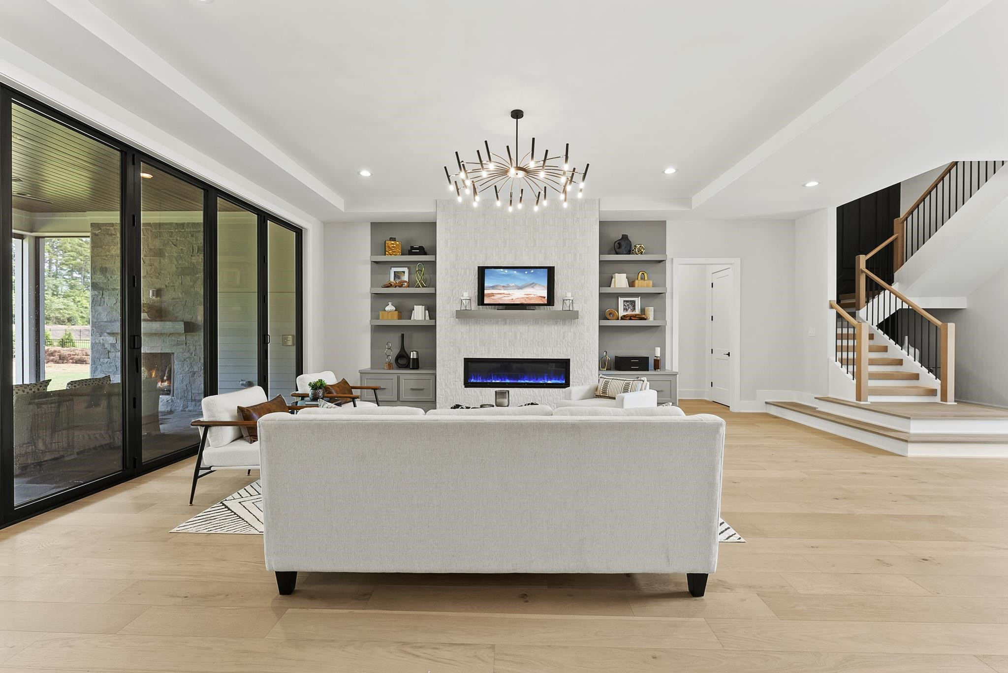1001 Enchanted Pine Lane Raleigh, NC 27614 - Photo 14 of 52 a living room with fireplace furniture and a large window