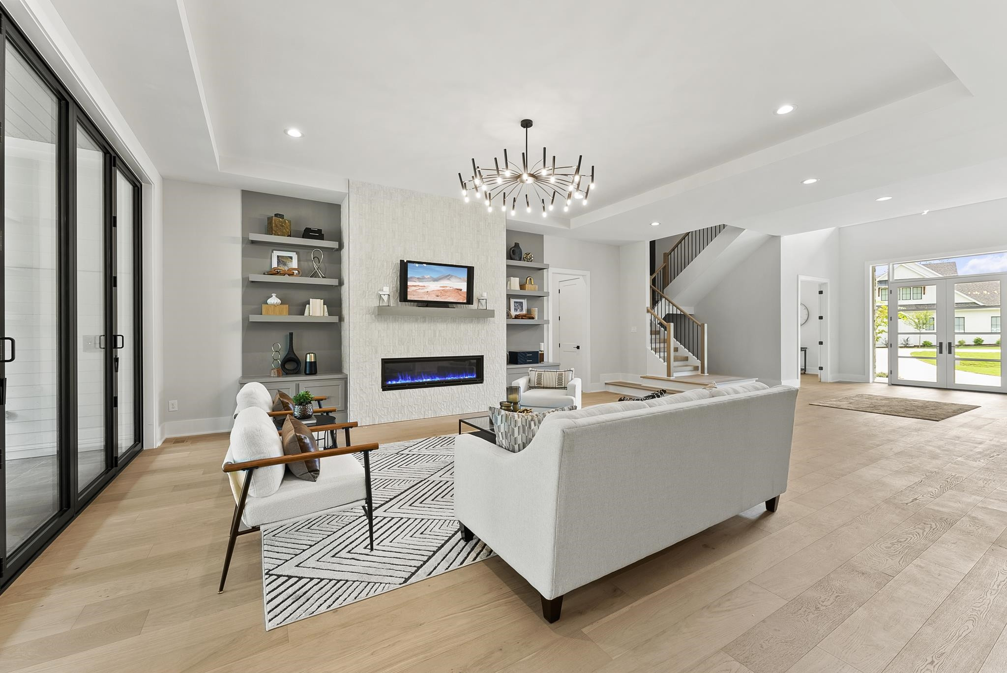 1001 Enchanted Pine Lane Raleigh, NC 27614 - Photo 15 of 52 a living room with furniture a fireplace and a flat screen tv
