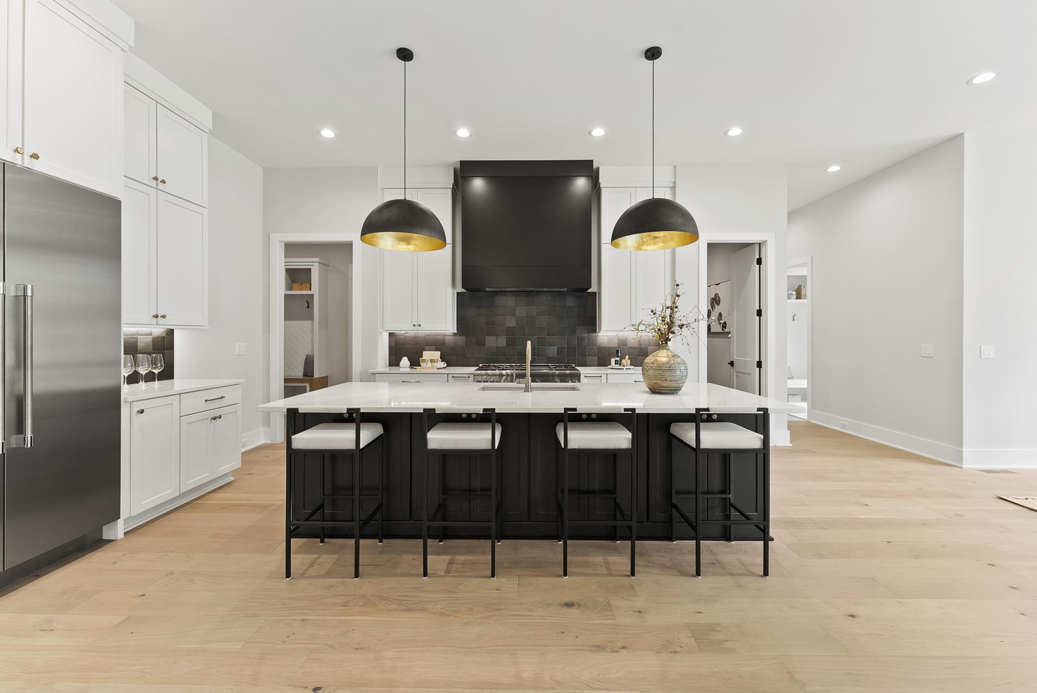 1001 Enchanted Pine Lane Raleigh, NC 27614 - Photo 16 of 52 a kitchen with a sink cabinets and dining table
