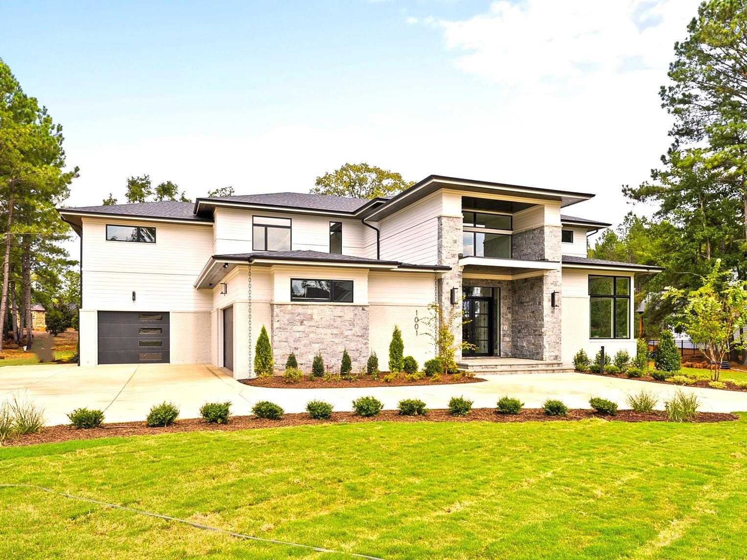 1001 Enchanted Pine Lane Raleigh, NC 27614 - Photo 2 of 52 a front view of a house with a yard
