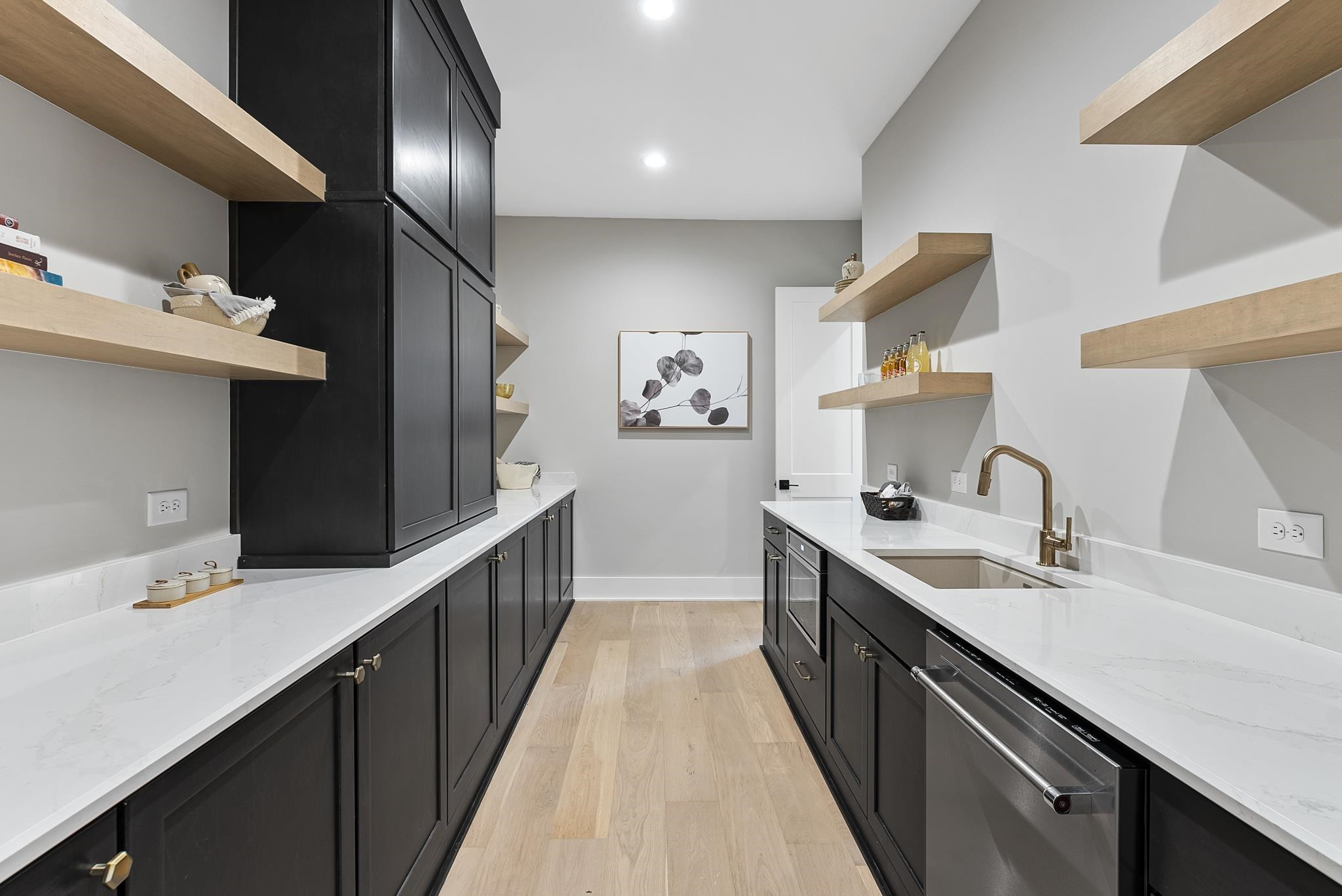 1001 Enchanted Pine Lane Raleigh, NC 27614 - Photo 22 of 52 a kitchen with a sink and cabinets