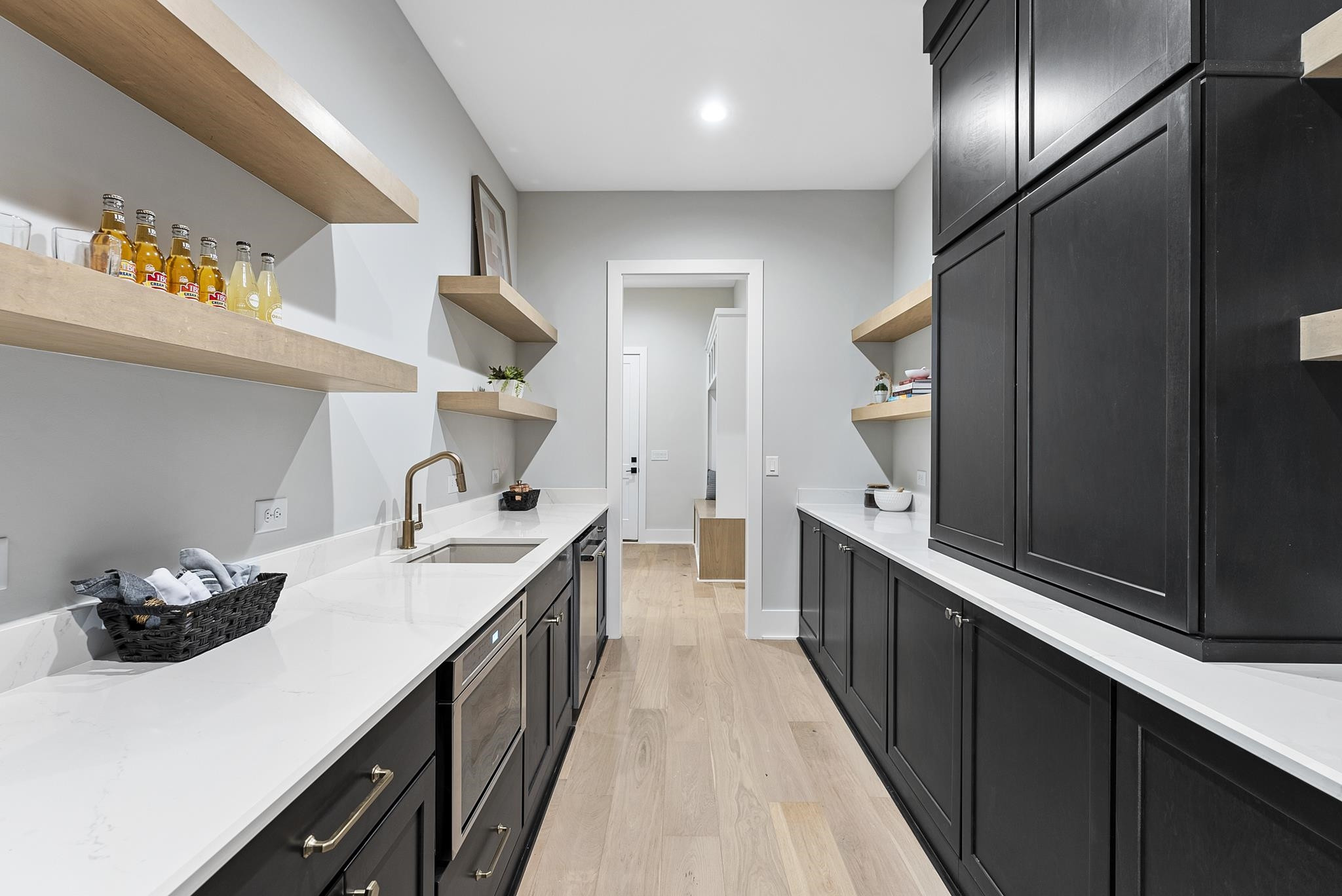 1001 Enchanted Pine Lane Raleigh, NC 27614 - Photo 24 of 52 a kitchen with a sink and stove