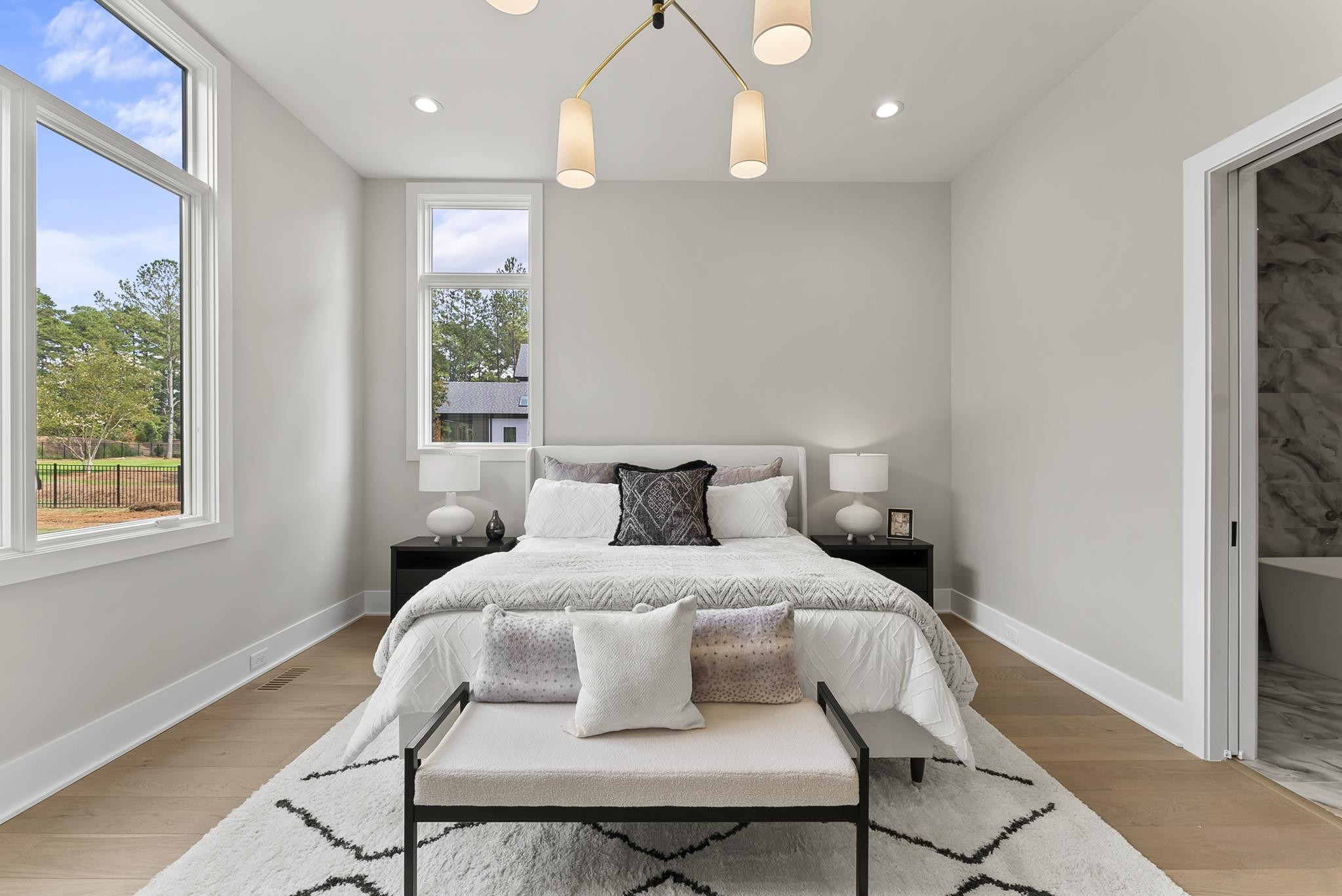 1001 Enchanted Pine Lane Raleigh, NC 27614 - Photo 27 of 52 a bedroom with a bed and window