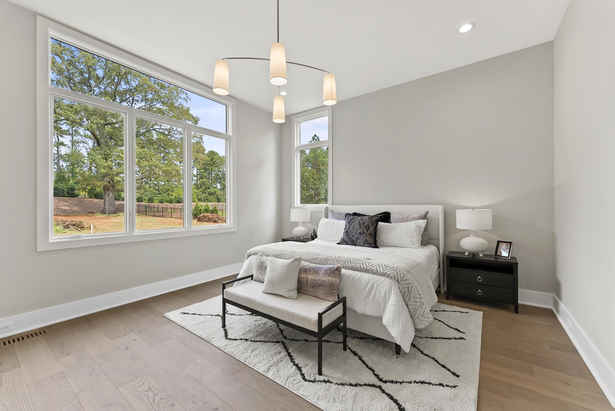 1001 Enchanted Pine Lane Raleigh, NC 27614 - Photo 28 of 52 a spacious bedroom with a bed and a window
