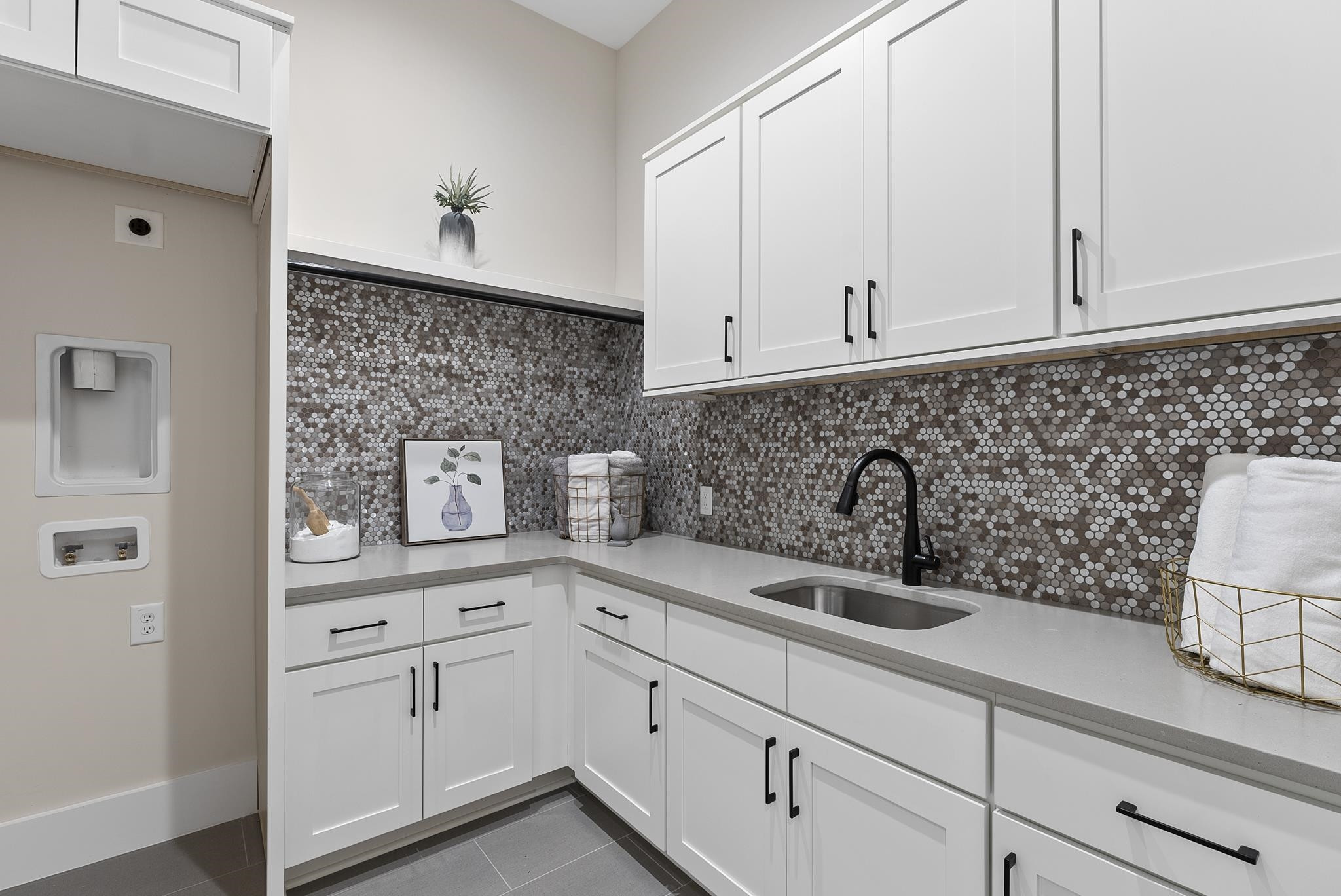 1001 Enchanted Pine Lane Raleigh, NC 27614 - Photo 35 of 52 a kitchen with white cabinets and sink