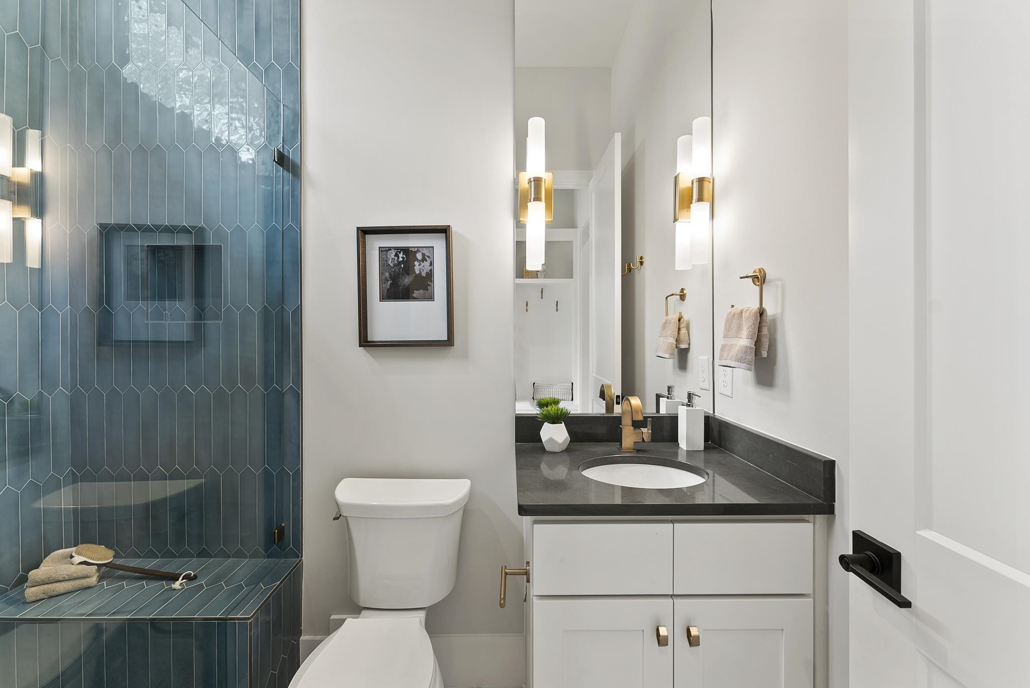 1001 Enchanted Pine Lane Raleigh, NC 27614 - Photo 37 of 52 a bathroom with a sink toilet and mirror