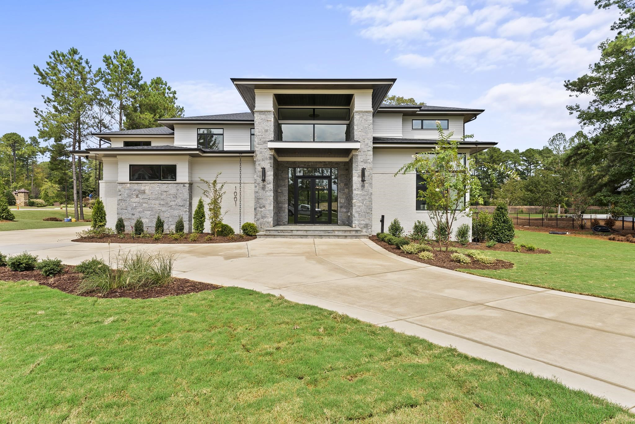 1001 Enchanted Pine Lane Raleigh, NC 27614 - Photo 4 of 52 a front view of a house with a yard