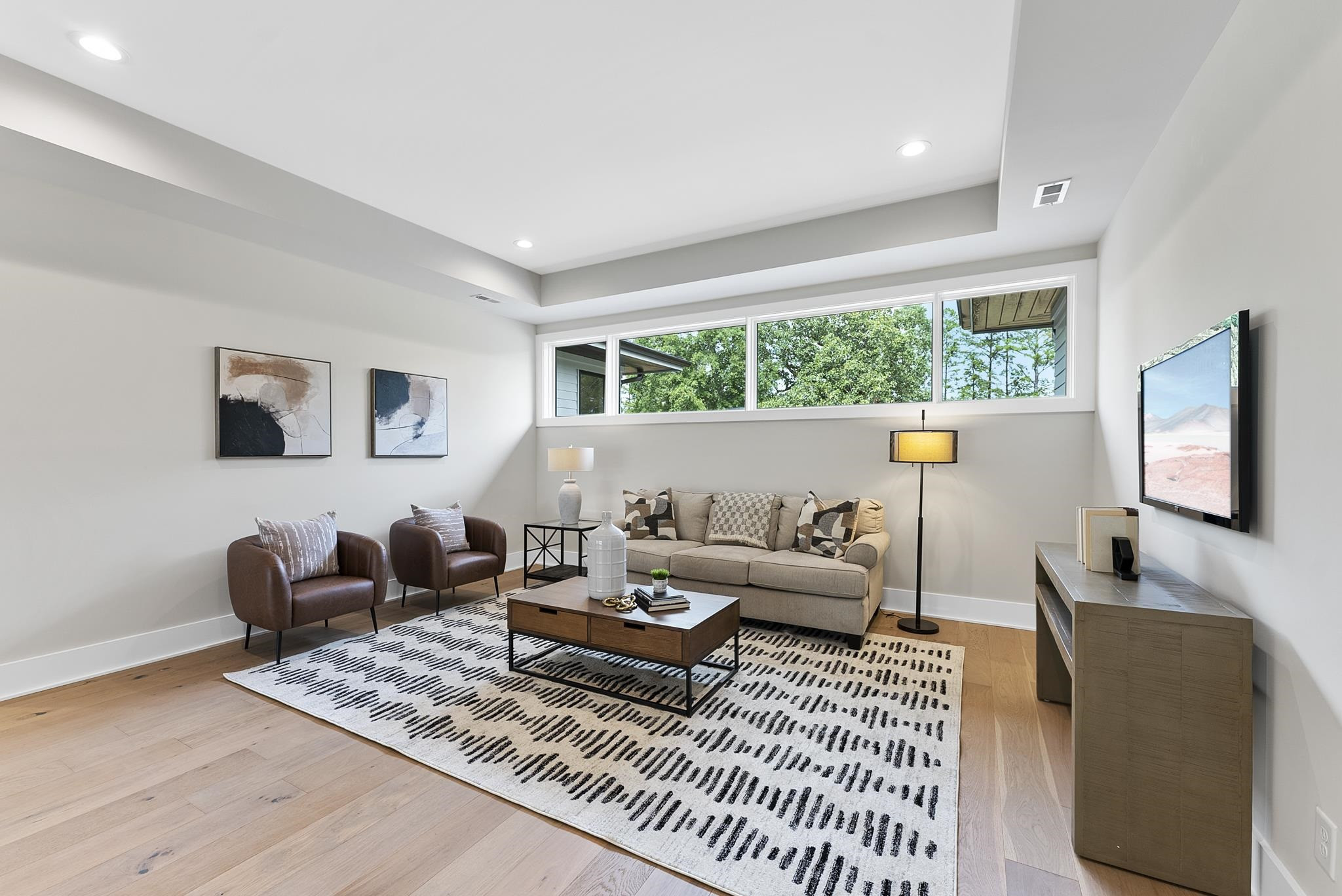 1001 Enchanted Pine Lane Raleigh, NC 27614 - Photo 41 of 52 a living room with furniture and a table