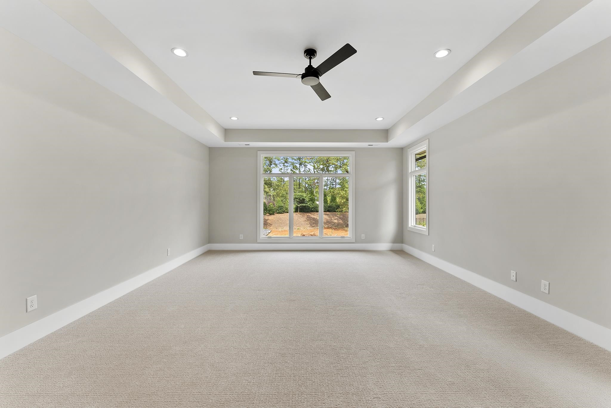 1001 Enchanted Pine Lane Raleigh, NC 27614 - Photo 43 of 52 wooden floor in an empty room with a window