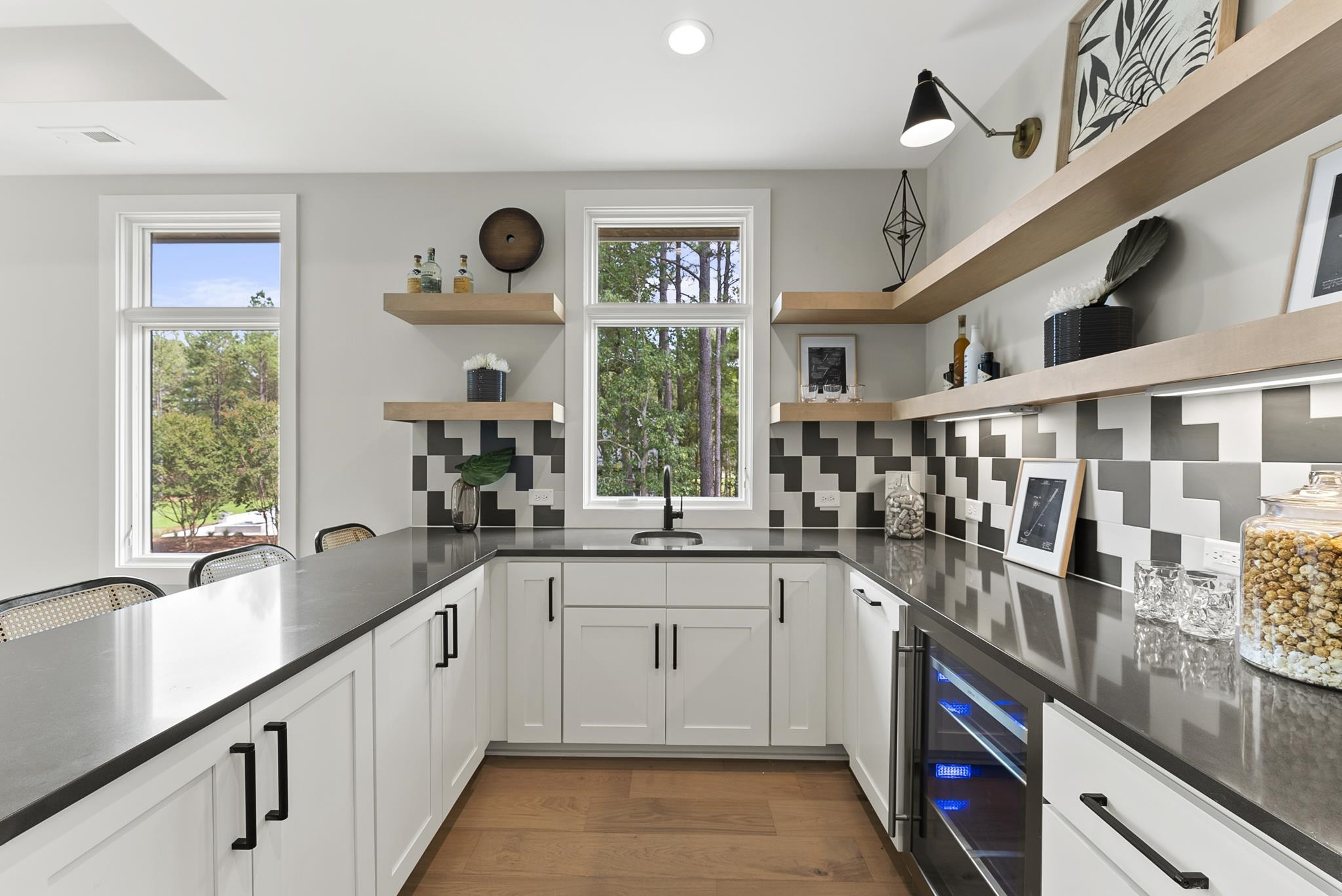 1001 Enchanted Pine Lane Raleigh, NC 27614 - Photo 45 of 52 a kitchen with stainless steel appliances granite countertop a sink and a large window
